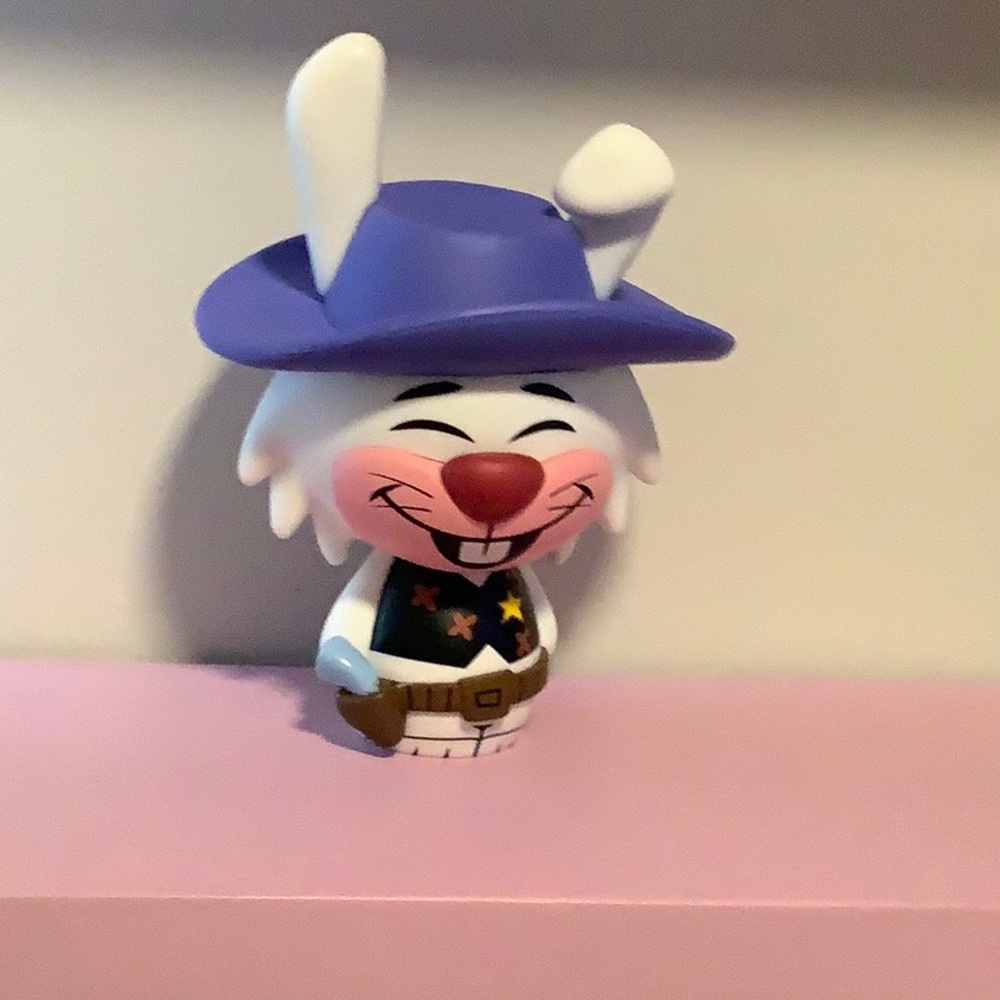 Playful Rabbit Figurine with Purple Hat